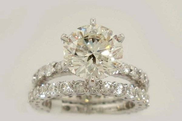 14kt White Gold Diamond Eternity Engagement Ring Set With 1.58 CTS Round Brilliant Center & Matching Eternity Wedding Band.
Shop: www.diamondsbyjanet.biz