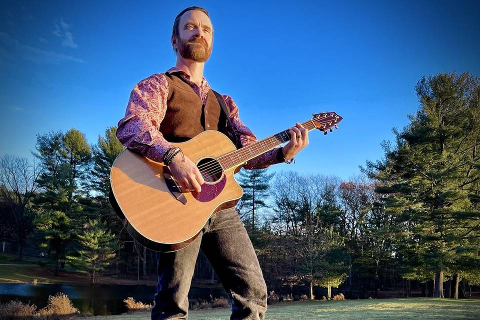 Solo acoustic by the pond