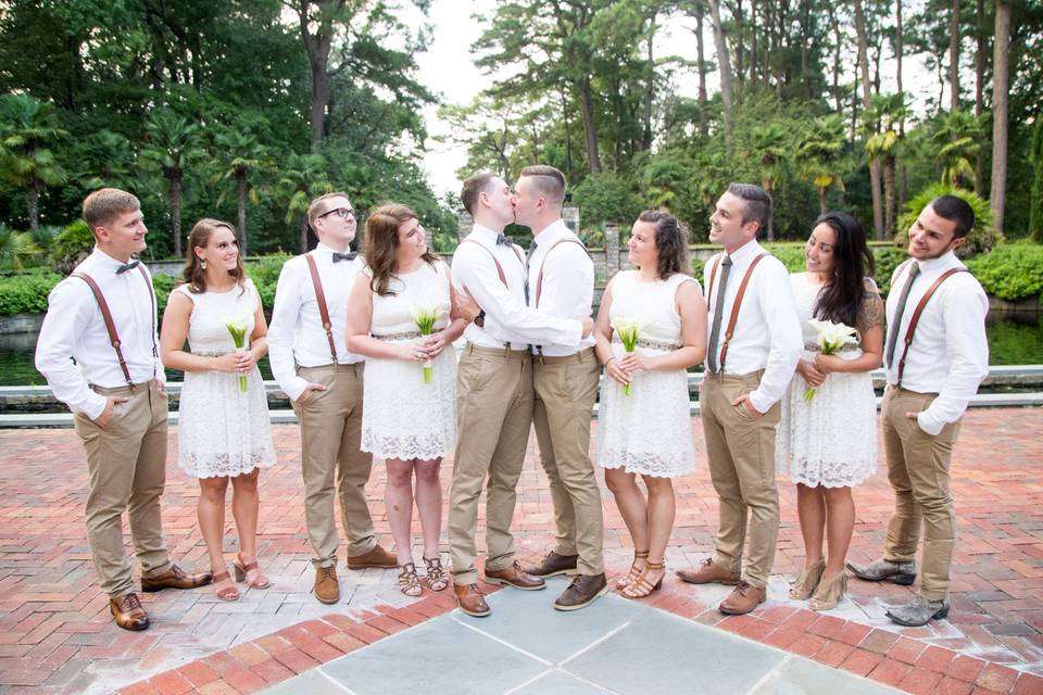 The newlyweds with the wedding attendants