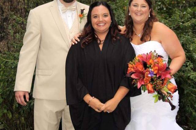 Officiant and the newlyweds