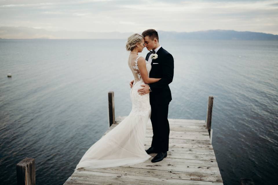 Newlyweds on a dock