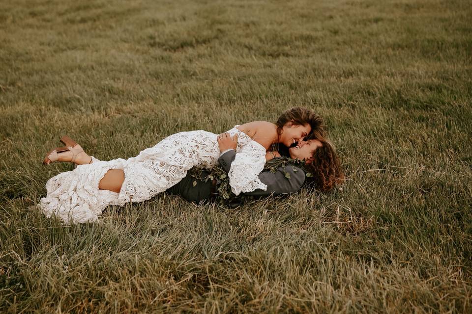 Couple kissing in the grass