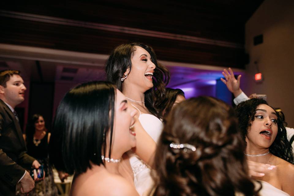 Brides up in the air laughing like they just don't care - and we love it!