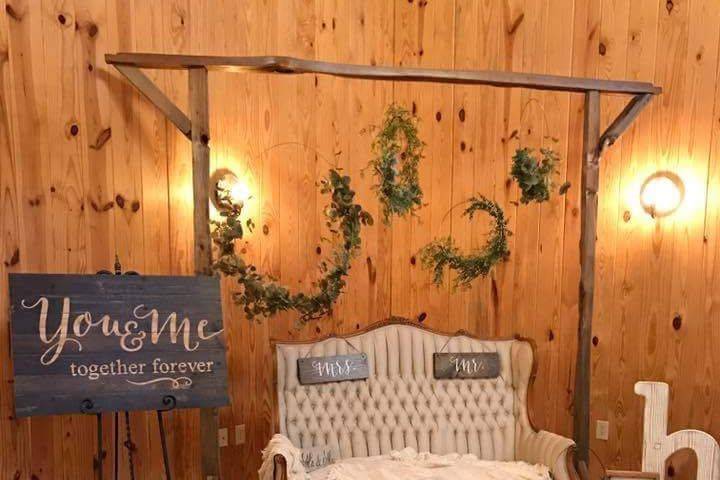 Split rail arch with floral hoops as accents