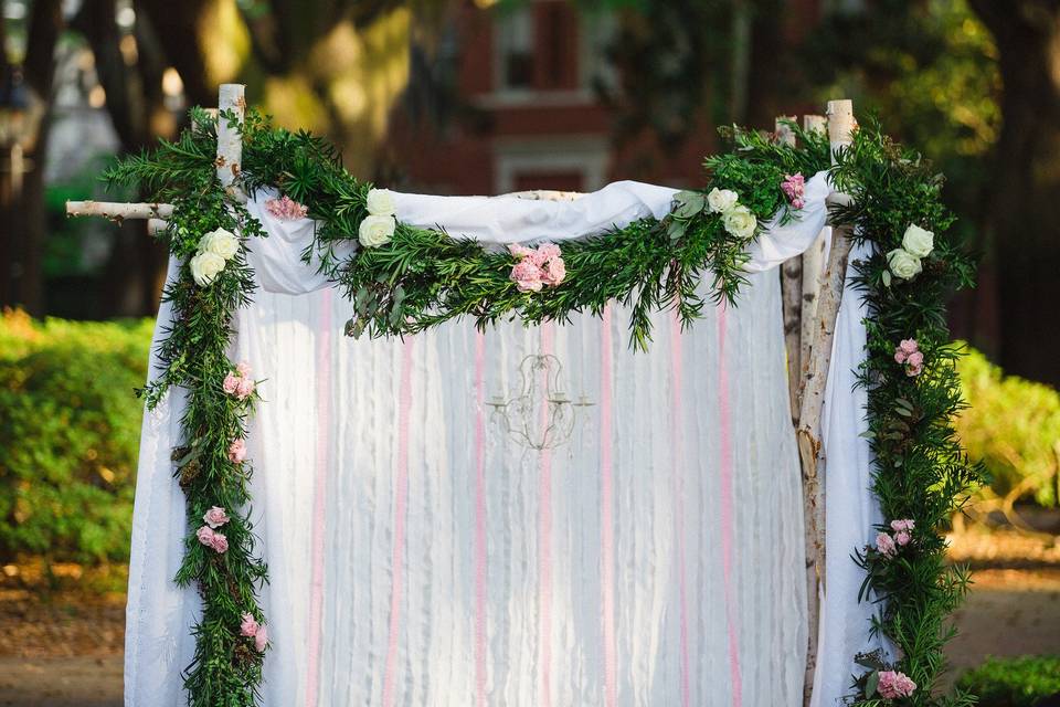 Custom Birch Arch, Floral Garland, Floral Jars, Bridal Flowers, Accent cabinet with flowers & Decor all provided by Coastal Creative's in-house designers!