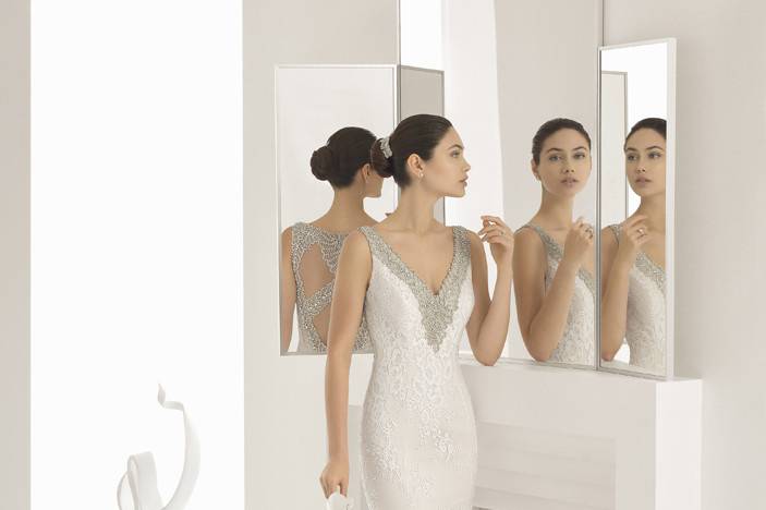 ROSA CLARA 	ODIN	<br>	Simplicity is the key to elegance. This dress combines sober lace with dazzling jewelled front and back necklines guaranteed to make you look amazing from every angle!