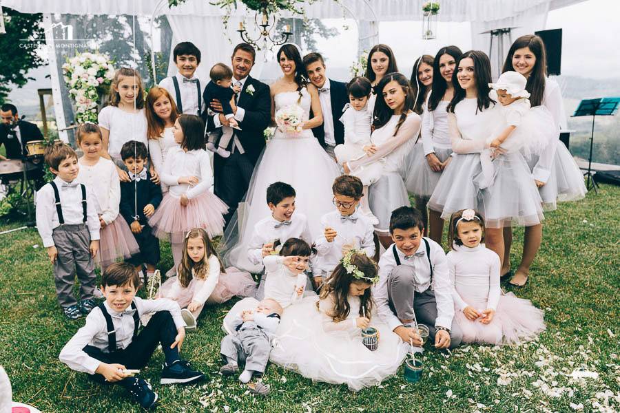 Newlyweds and the kids at their wedding