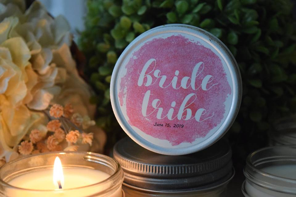 Bride Tribe, Pink Watercolor Soy Candle Favor, $4.95 each. Our all-natural, dye-free soy candles are hand-poured in the Peach State of Georgia! We use Eco-friendly soy wax, hemp wicks and phthalate-free fragrance oils. This 4oz  jar  is clean and simple in design, which allows for great flexibility in designing your favor gifts! All of our label options look amazing on these jars. They can be dressed-up even further with organza, ribbons, rhinestones and much more! This candle will burn for approximately 30 hours!