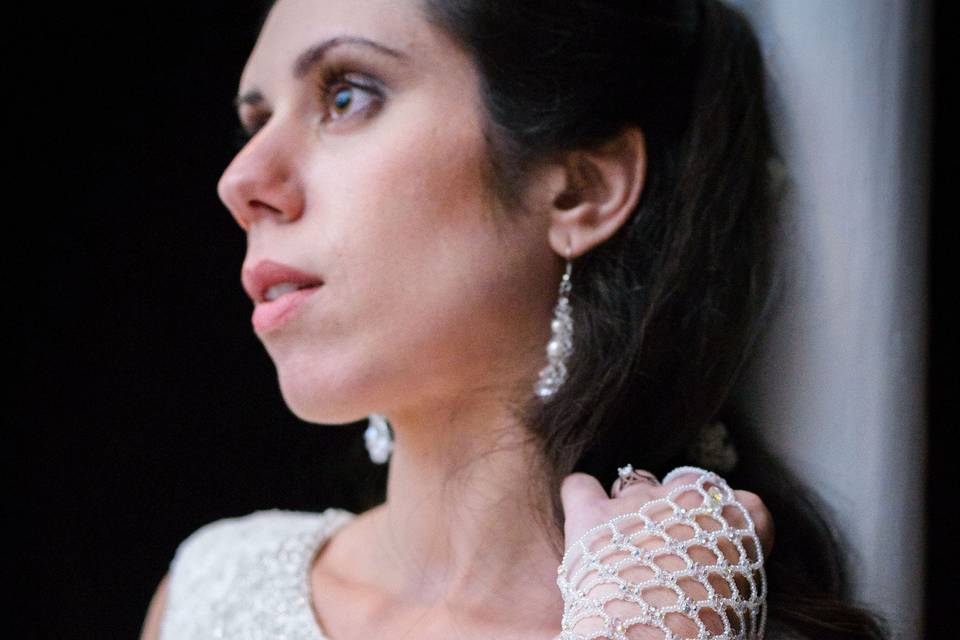 Stunning and unique beaded finger loop gloves.  No fabric backing! Structure is made with pearl Czech glass and faceted crystal glass beads alone. Long draping silver Czech glass and crystal necklace- necklace was sewn to the dresses neckline for perfect look.  Silver Czech glass and crystal belt.  Crystal and pearl drop earrings.
