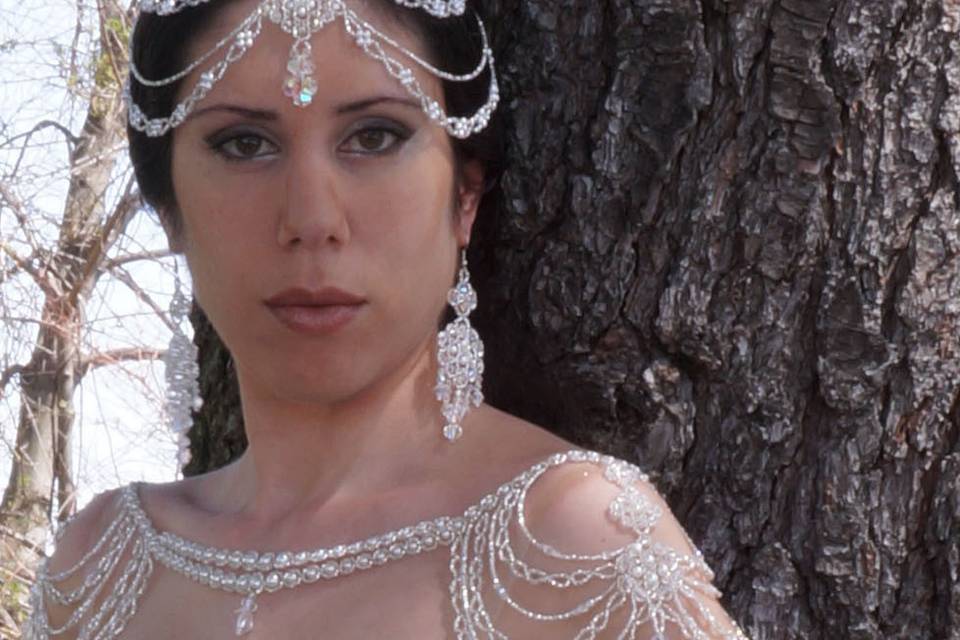 Stunning statement headpiece, earrings and shoulder necklace.  Made with Swarovski crystal, celestial crystal, Swarovski pearl, fire polished Czech glass and silver Czech glass.