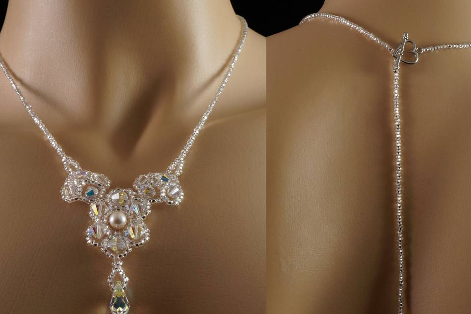 Lovely backdrop necklace woven with Swarovski crystal, Swarovski pearl, Swarovski crystal teardrops and silver Czech glass.