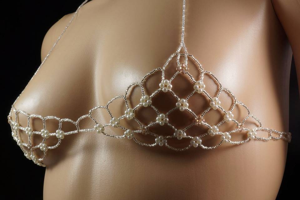 Stunning and unique beaded bridal lingerie.  No fabric backing! Structure is made with silver Czech glass, pearls, and champagne faceted glass alone. Very sensual and glamorous.