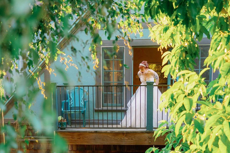 Bride peeking over at dinner