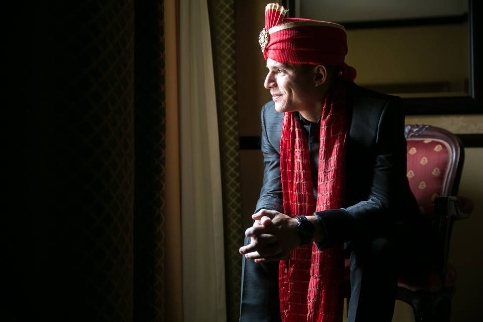 Such a handsome groom, preparing to marry the love of his life.