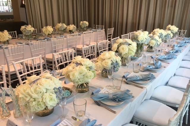 Bridal shower with white and accents of baby blue, private dining room, set for 40