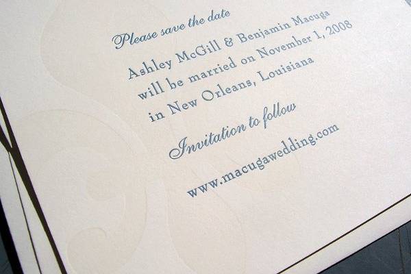 Custom-designed letterpress-printed save-the-date featuring simple text printed over a faint fleur de lis. Perfect for a New Orleans wedding!
