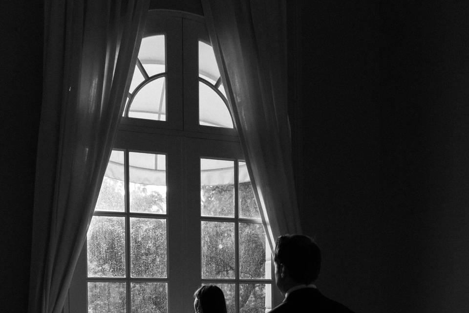 Bride facing window