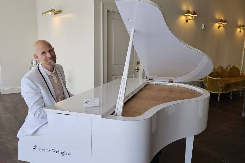 White baby grand piano shell