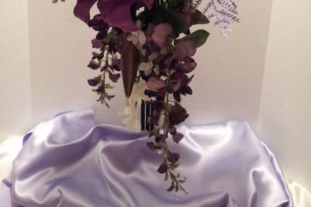 Royal brides bouquet.  Full of Stargaziers, roses, peonies, wysteria,and hydrangeas.  Total length 24