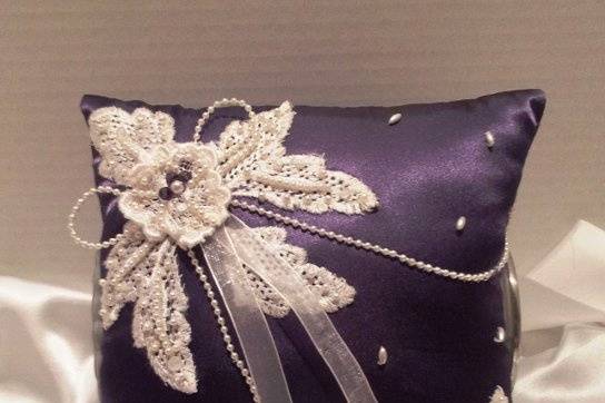 Custom made ring bearer pillow. Over 170 hand sewn pearl, lace and organza ribbon.  Beautiful to display after ceremony or a forever keepsake.