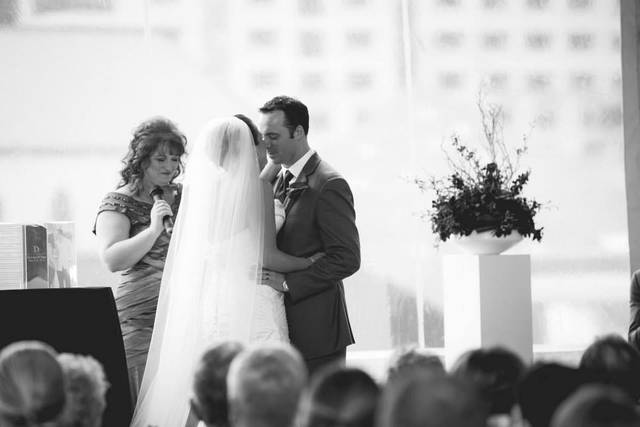 Couple with officiant