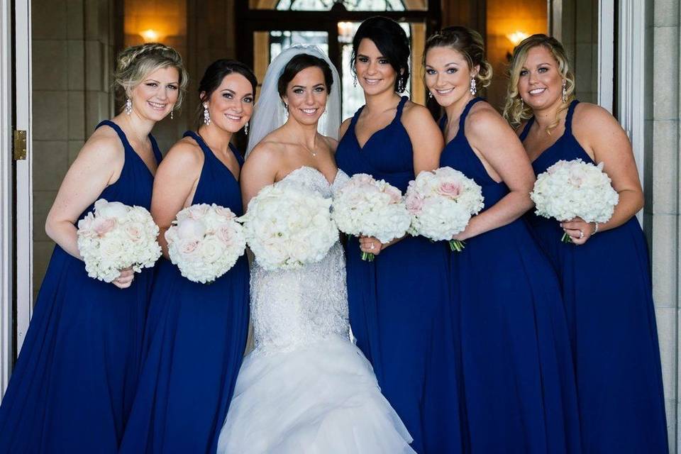 Bridesmaids in blue with the bride