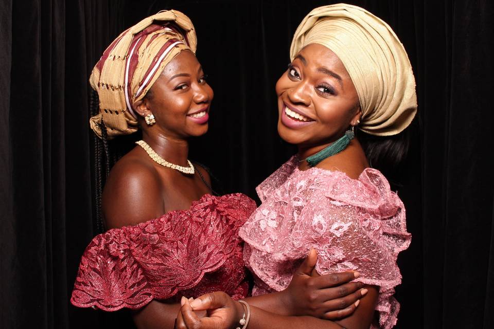 Two women smile for the camera