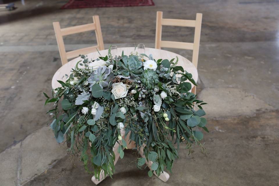 Eucalyptus and succulent wedding, sweetheart table  - Royal Bee Florals and Events