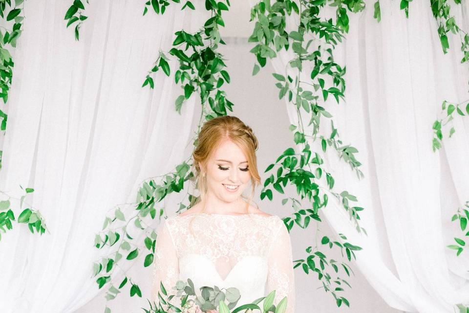 Chuppah draped in greenery