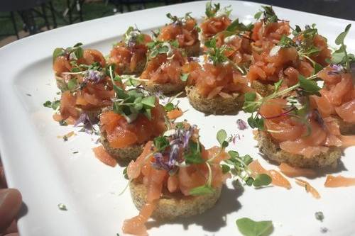 Smoked salmon on rye crustini