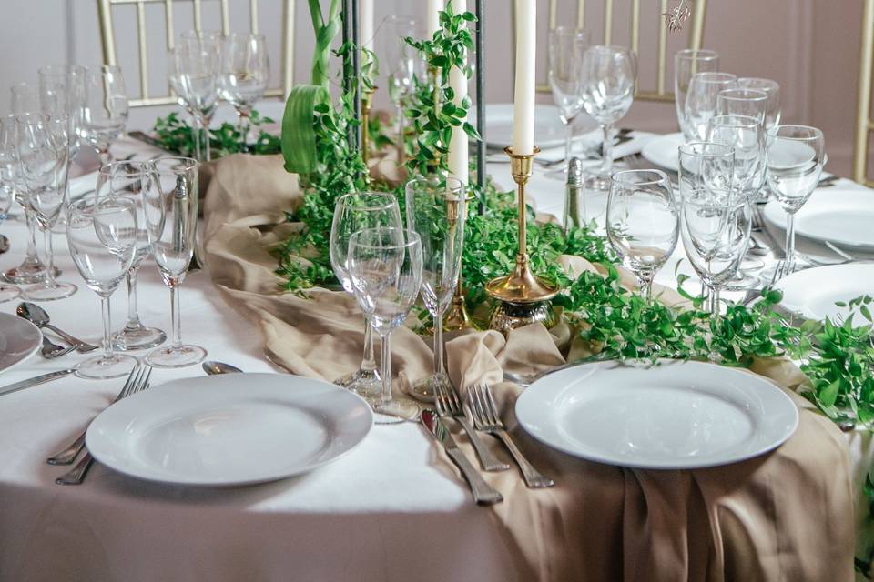 Tables set up with the backdrop of the magnificent Grand Salon