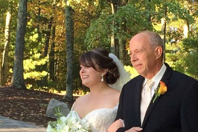 Daddy's little girl chose and elegant cascade style bouquet .