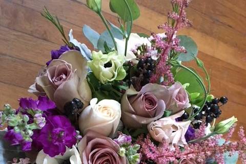 Garden style with lots of texture creates an interesting bouquet.