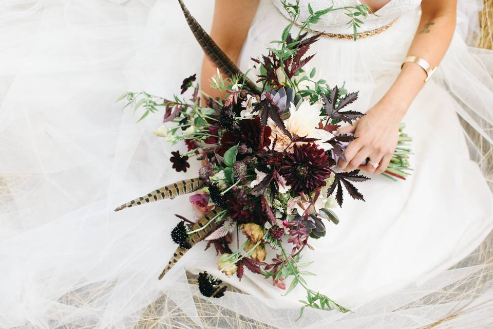 Bo-ho bride with Blush and Marsala bouquet.