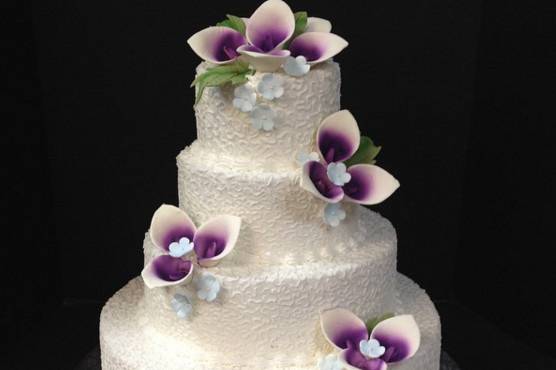 White wedding cake with flowers