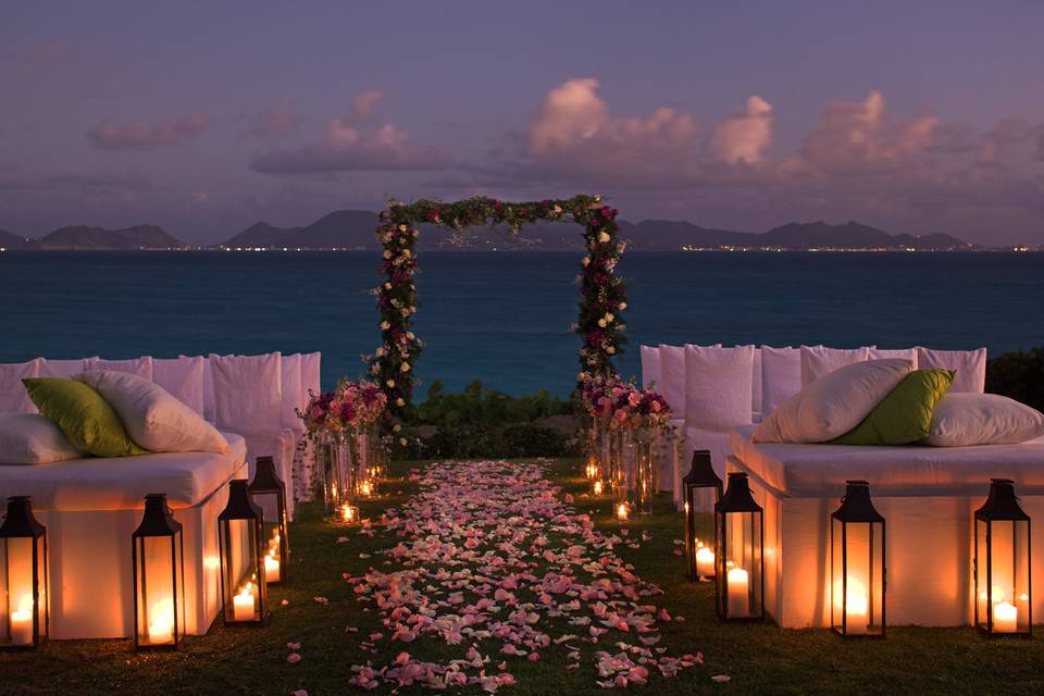Wedding ceremony on the lawn, ocean-side at Cap Juluca.