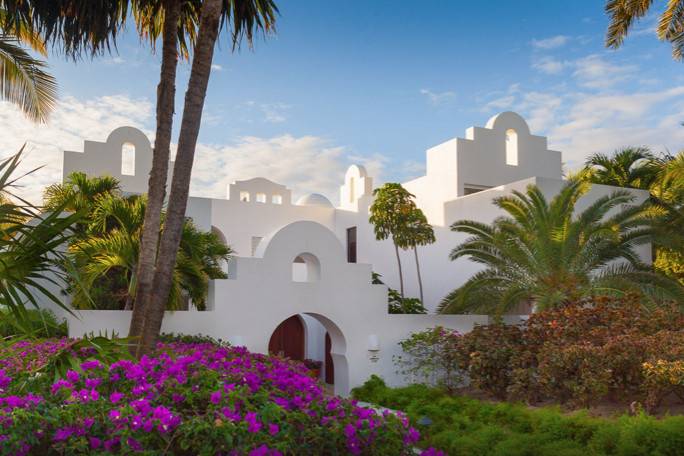 Beautiful architecture of Cap Juluca with lush gardens.