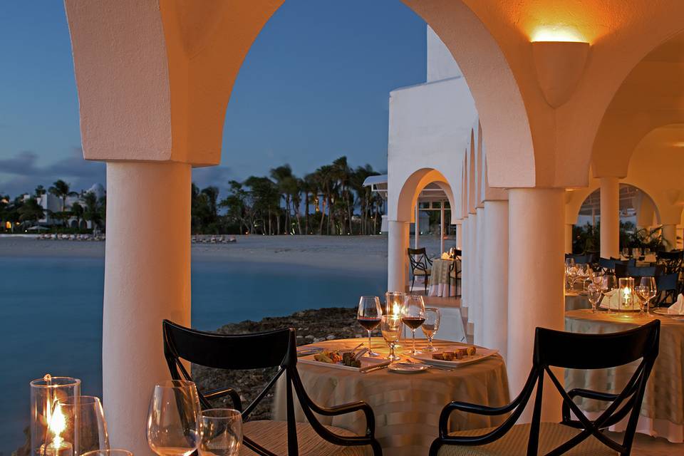 Dinner by candlelight overlooking the beach.