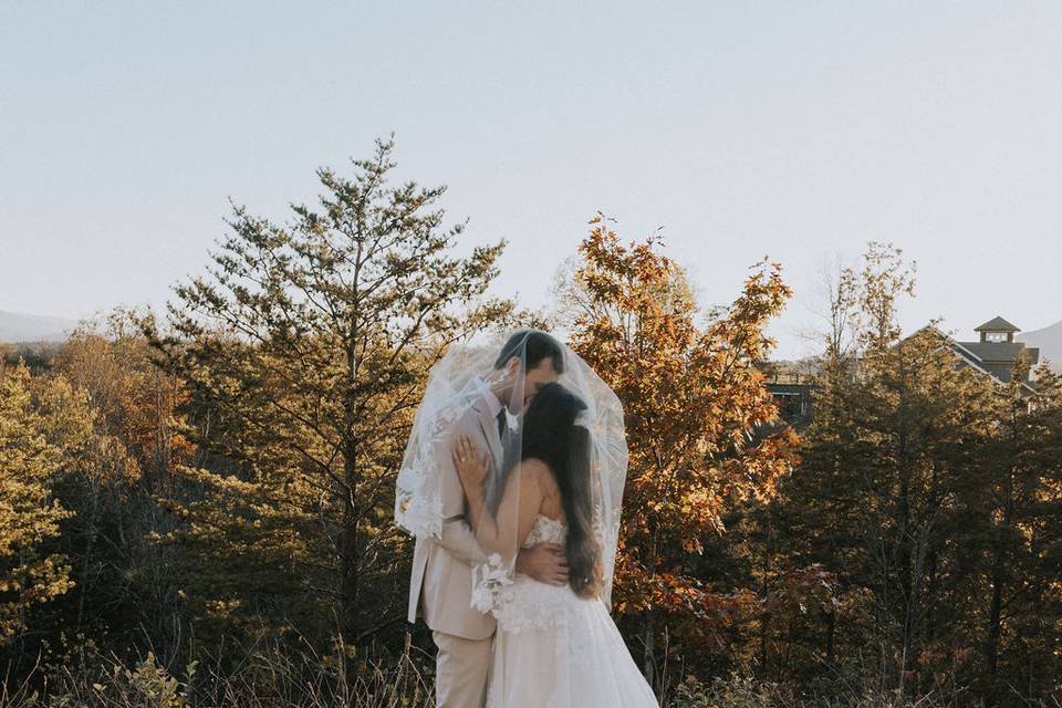 Bride & Groom Under Veil