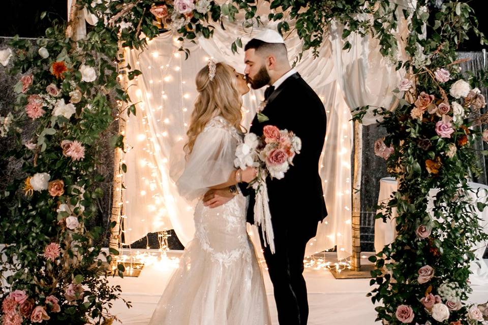 Bride and Groom Under Chuppah