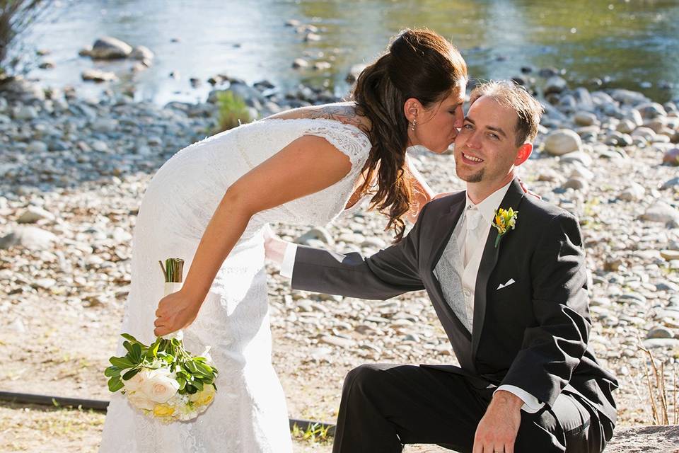 Bride and groom kiss