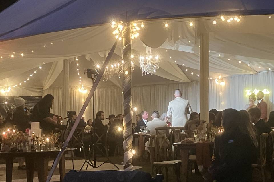 The wedding tent lit up