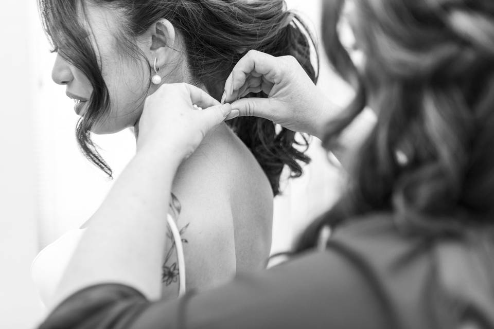 Mom Putting on Jewelry