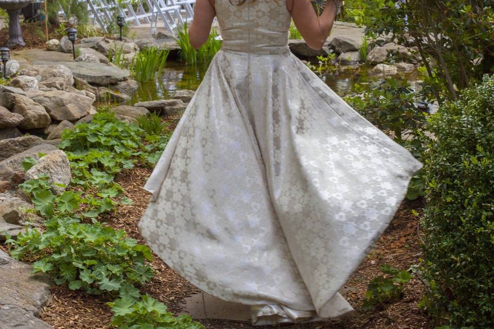 Bride walking through a forest