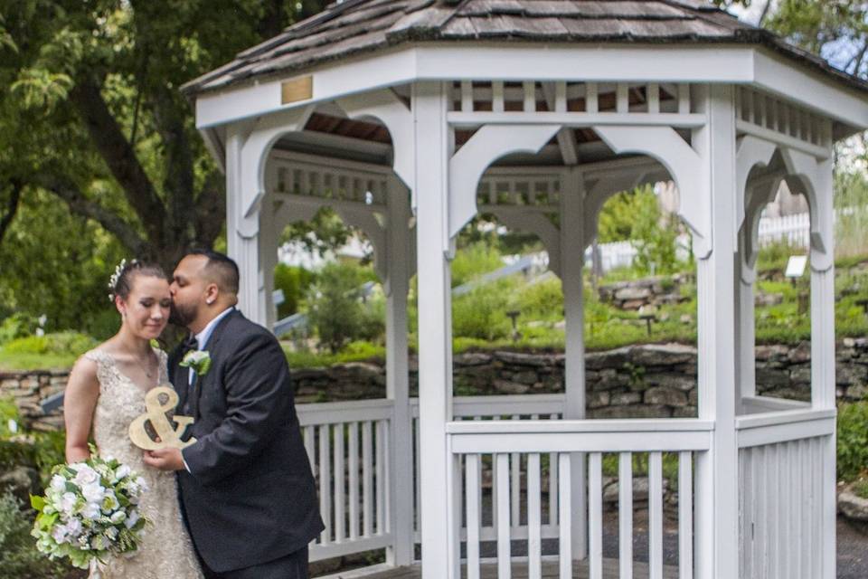 Couple beside a gazebo