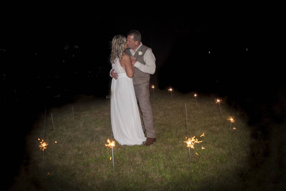 Couple kissing on grass