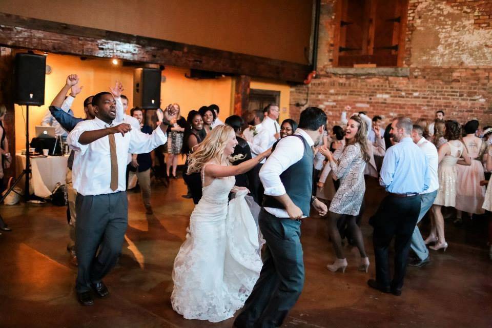 Couple and guests dancing