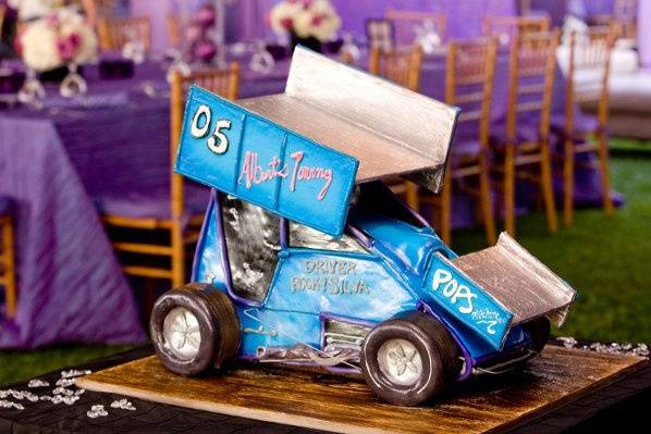 As a tribute to their passion for race cars, the groom's cake was designed to be a miniature replica of the groom's actual car. Photo by Chrissy Lambert.