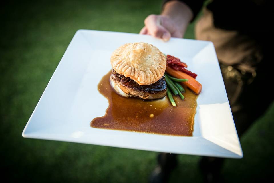 The main course:  Grilled Beef Tenderloin Wellington with Mushroom Foie Gras Truffle Puff, Mashed Potatoes, Taro and Baby Carrots, and Haricot Vert.  Catering by Chef Chai.  Photo by Frank J. Lee Photography.  #neuevents #neueventshawaii
