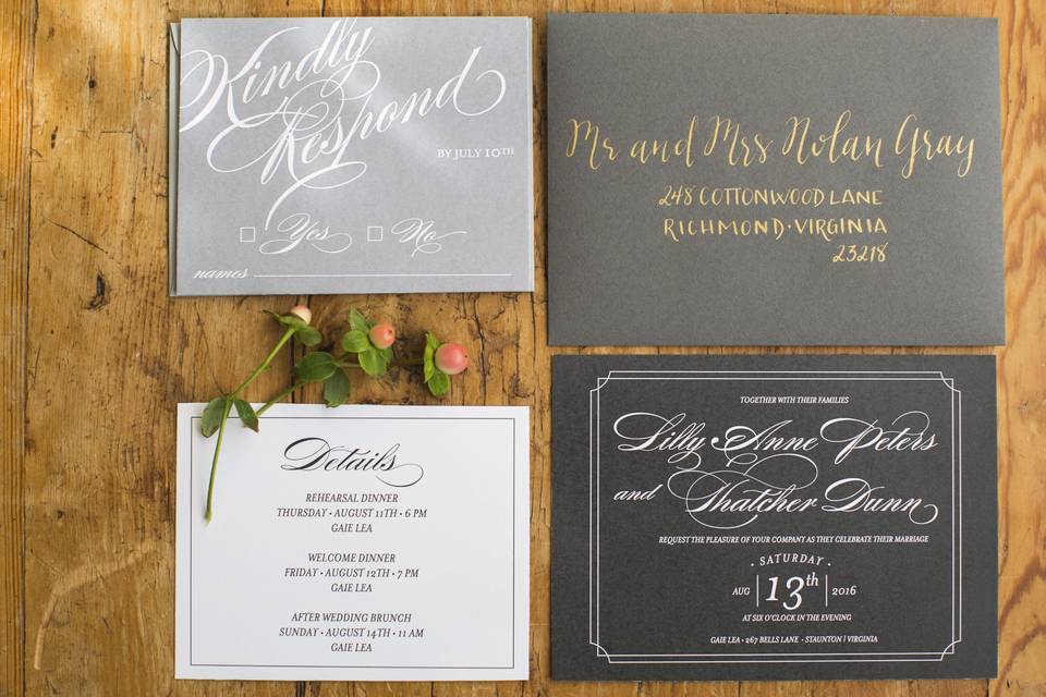 Charcoal, gray, white, black with pops of gold wedding invitation suite